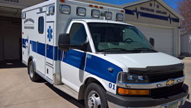 White ambulance with blue stripe