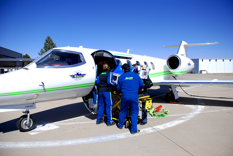 Staff boarding a small aeroplane